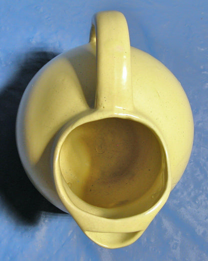 Vintage Pottery Yellow tilt ball water pitcher with ice lip - FranksFunkyStuff
