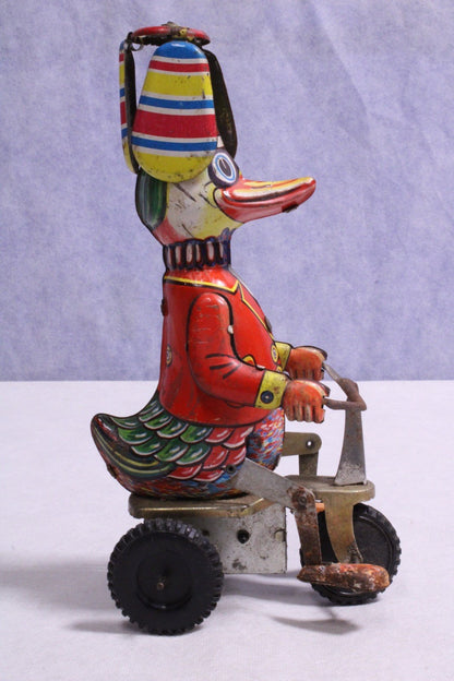 Vintage Wind - up Tin Toy "Duck on Tricycle" Propeller Toped Hat - FranksFunkyStuff
