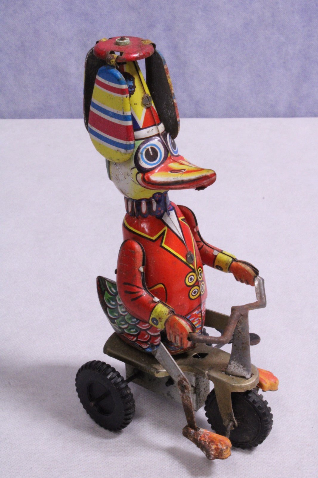 Vintage Wind - up Tin Toy "Duck on Tricycle" Propeller Toped Hat - FranksFunkyStuff
