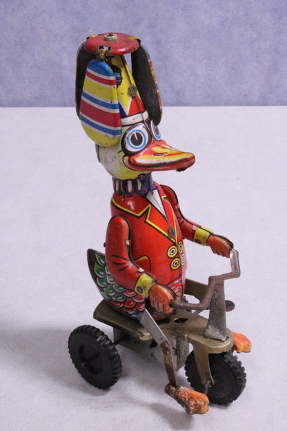 Vintage Wind - up Tin Toy "Duck on Tricycle" Propeller Toped Hat - FranksFunkyStuff